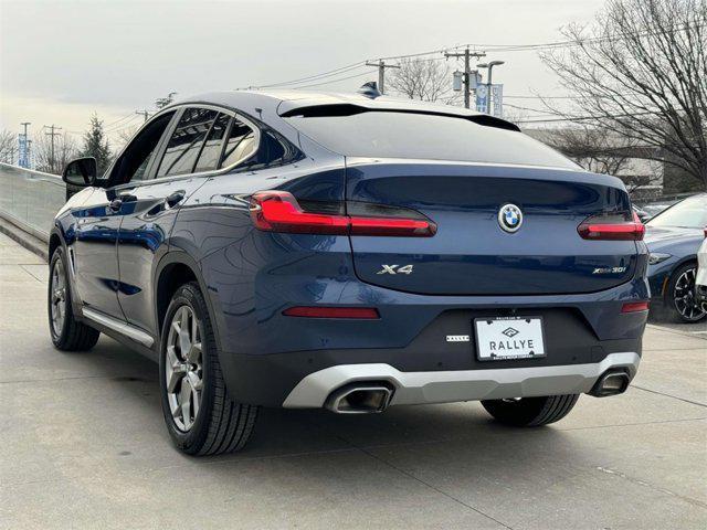 used 2022 BMW X4 car, priced at $39,998