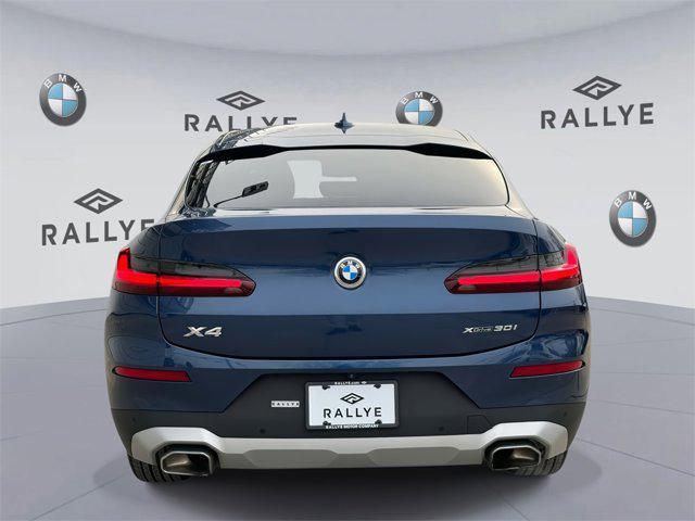 used 2022 BMW X4 car, priced at $39,998