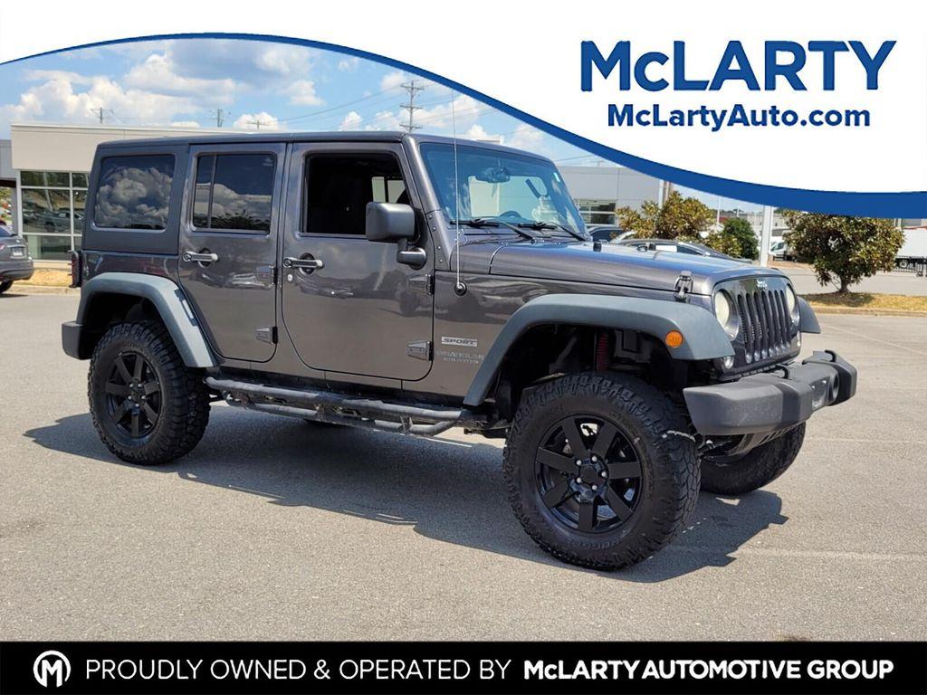 used 2014 Jeep Wrangler Unlimited car, priced at $16,989