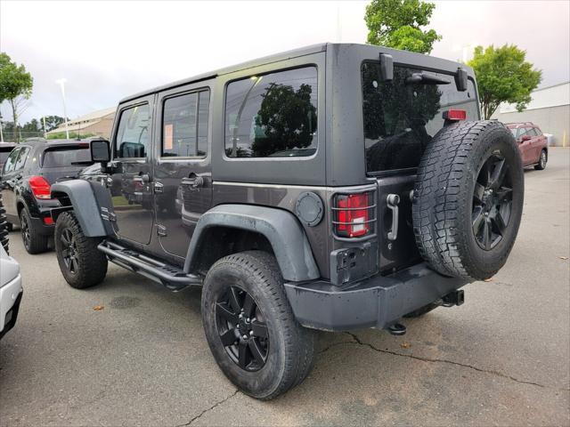 used 2014 Jeep Wrangler Unlimited car, priced at $17,516