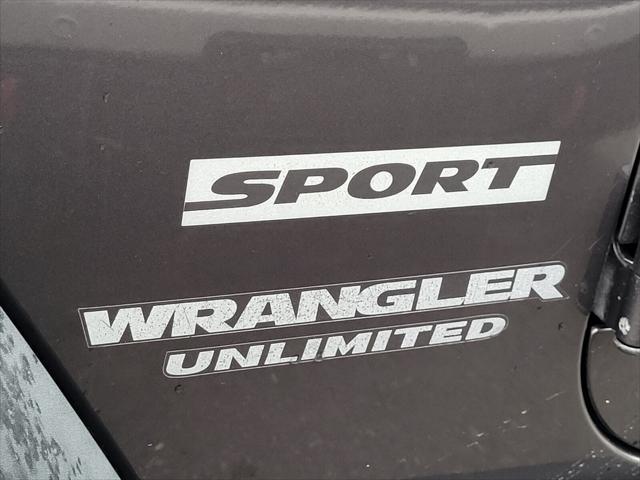 used 2014 Jeep Wrangler Unlimited car, priced at $17,516