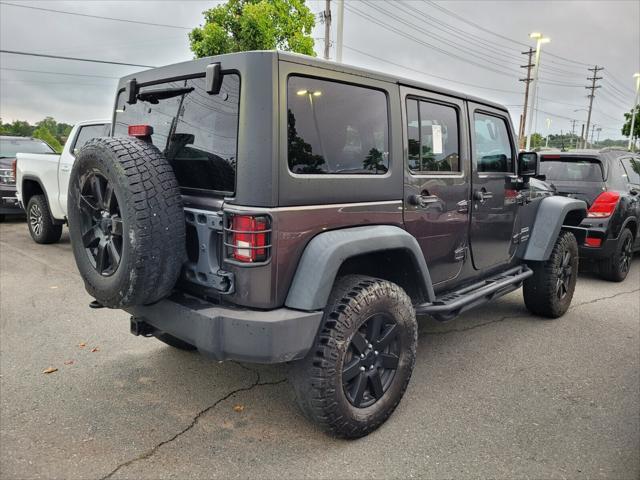 used 2014 Jeep Wrangler Unlimited car, priced at $17,516