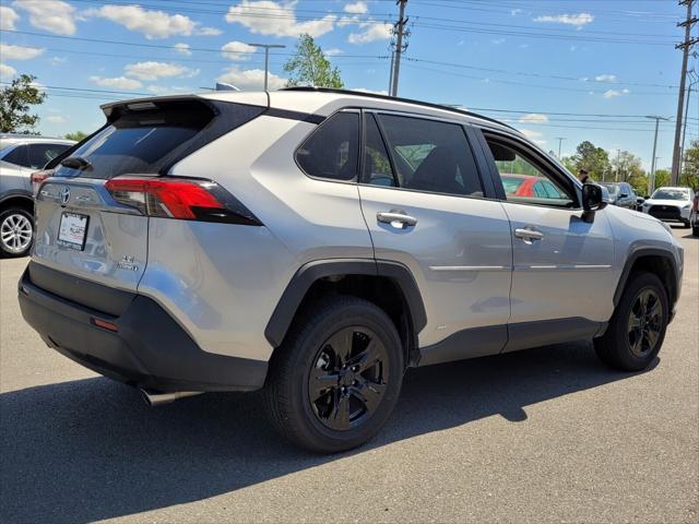 used 2022 Toyota RAV4 Hybrid car, priced at $30,000