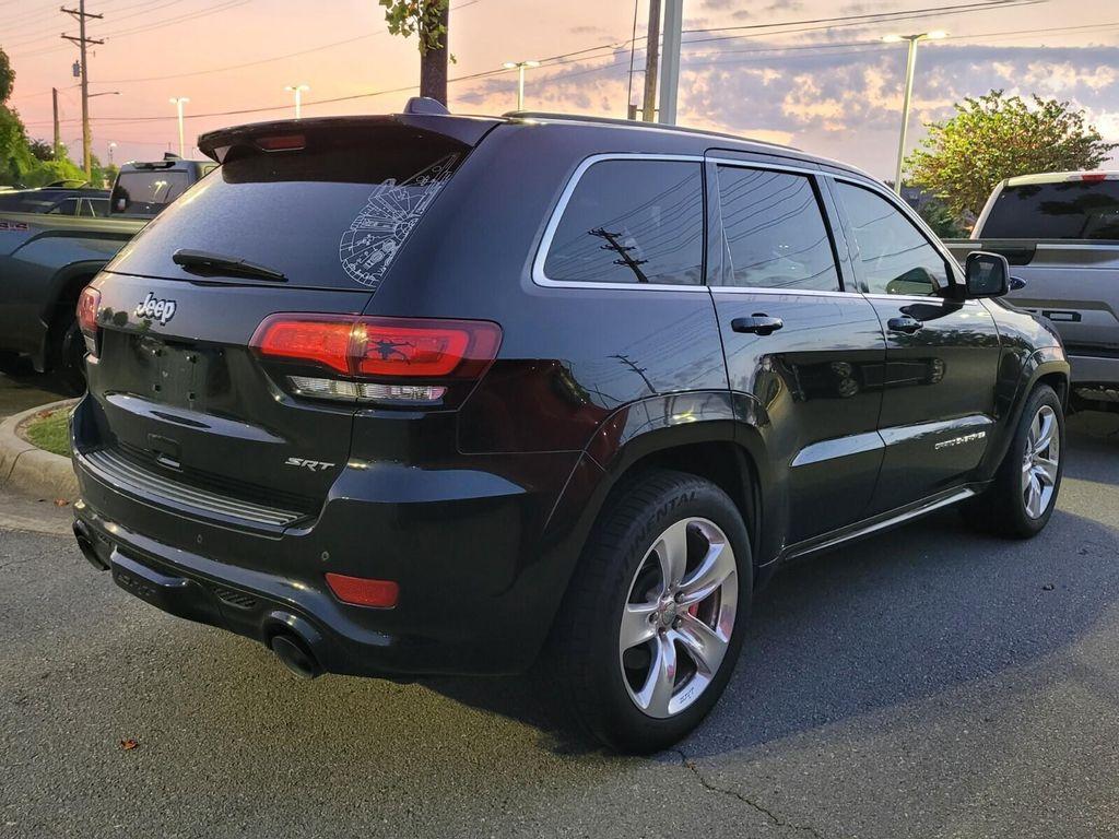 used 2014 Jeep Grand Cherokee car, priced at $22,889
