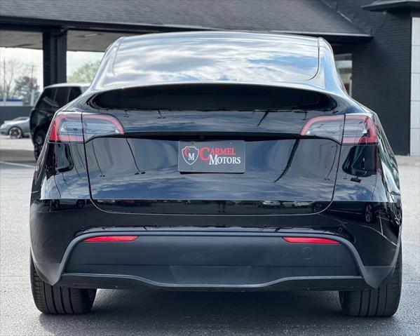 used 2021 Tesla Model Y car, priced at $28,500