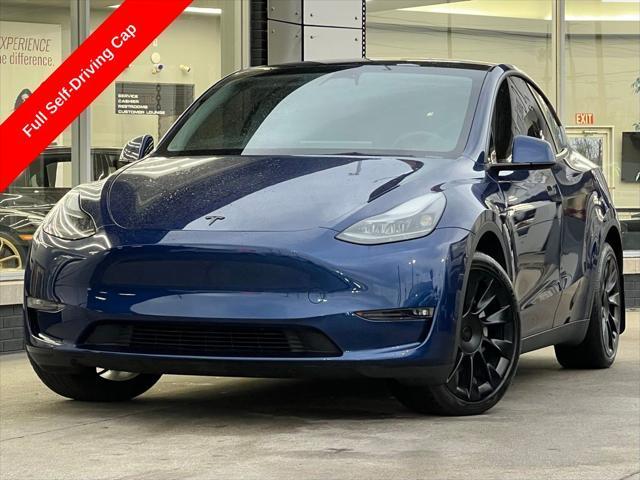 used 2023 Tesla Model Y car, priced at $32,995