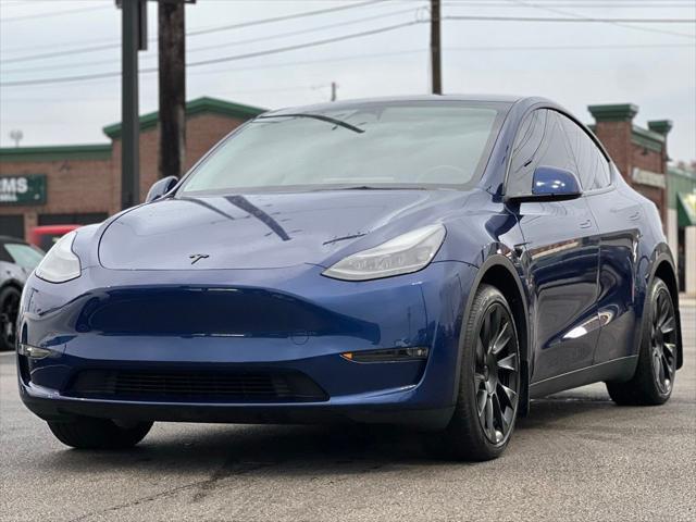 used 2023 Tesla Model Y car, priced at $32,995