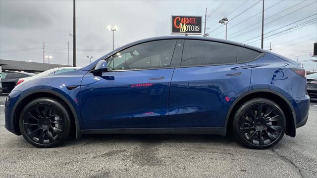 used 2023 Tesla Model Y car, priced at $32,995