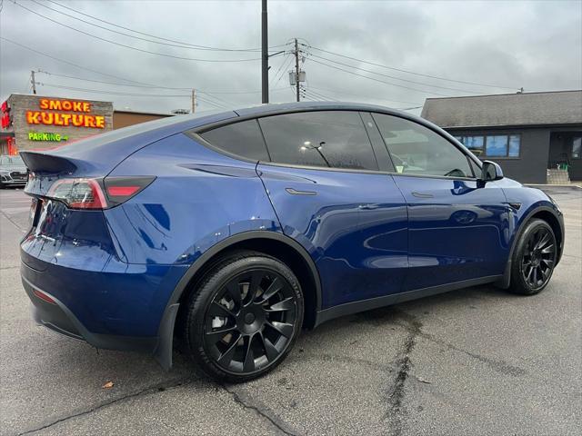 used 2023 Tesla Model Y car, priced at $32,995