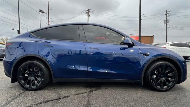 used 2023 Tesla Model Y car, priced at $32,995