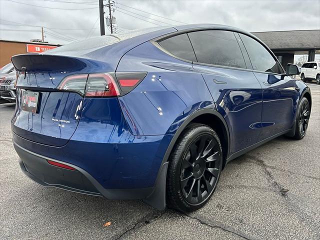 used 2023 Tesla Model Y car, priced at $32,995