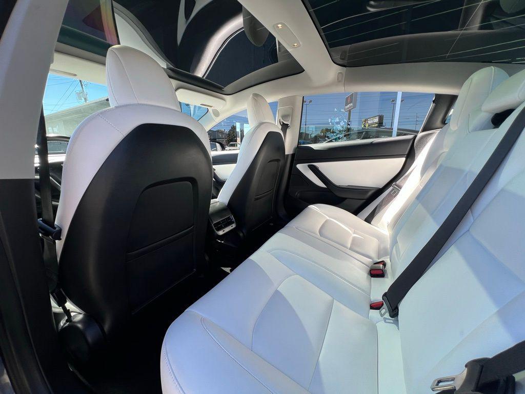 used 2018 Tesla Model 3 car, priced at $23,500