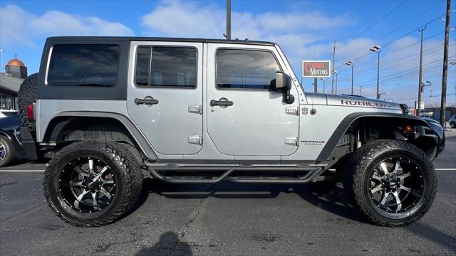 used 2014 Jeep Wrangler Unlimited car, priced at $20,995