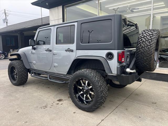 used 2014 Jeep Wrangler Unlimited car, priced at $22,995