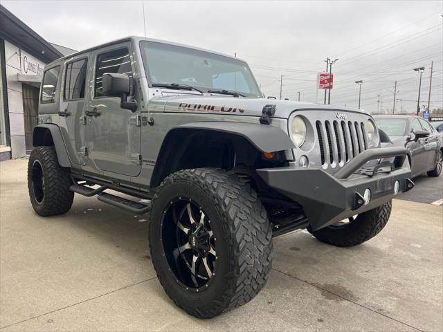 used 2014 Jeep Wrangler Unlimited car, priced at $22,995