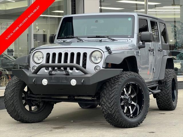 used 2014 Jeep Wrangler Unlimited car, priced at $21,995