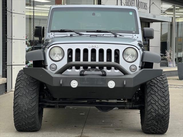 used 2014 Jeep Wrangler Unlimited car, priced at $22,995