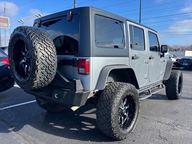 used 2014 Jeep Wrangler Unlimited car, priced at $20,995