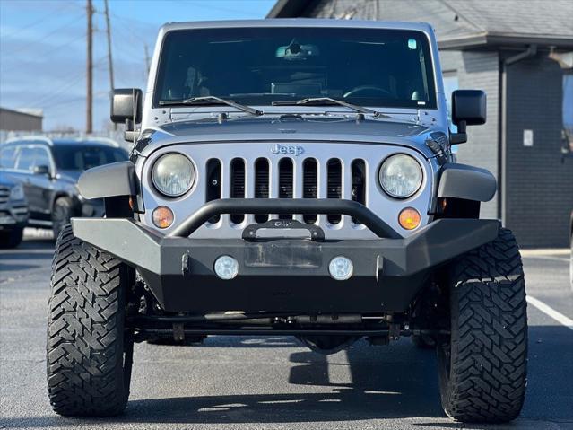 used 2014 Jeep Wrangler Unlimited car, priced at $20,995