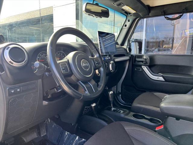 used 2014 Jeep Wrangler Unlimited car, priced at $20,995