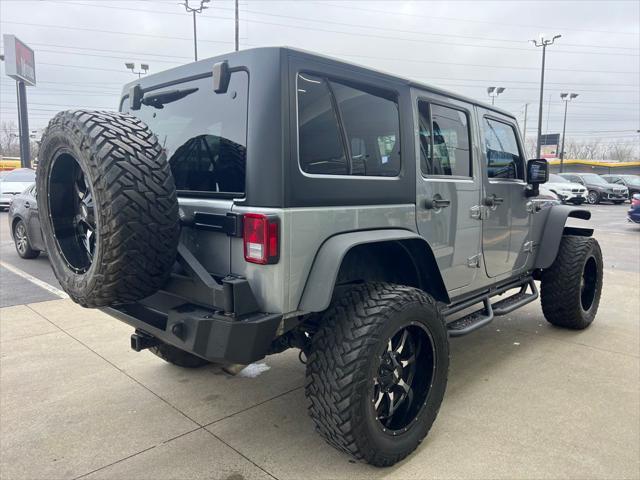 used 2014 Jeep Wrangler Unlimited car, priced at $22,995