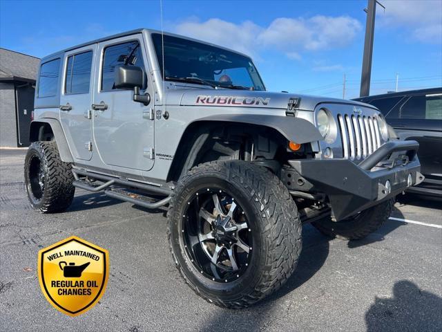 used 2014 Jeep Wrangler Unlimited car, priced at $20,995