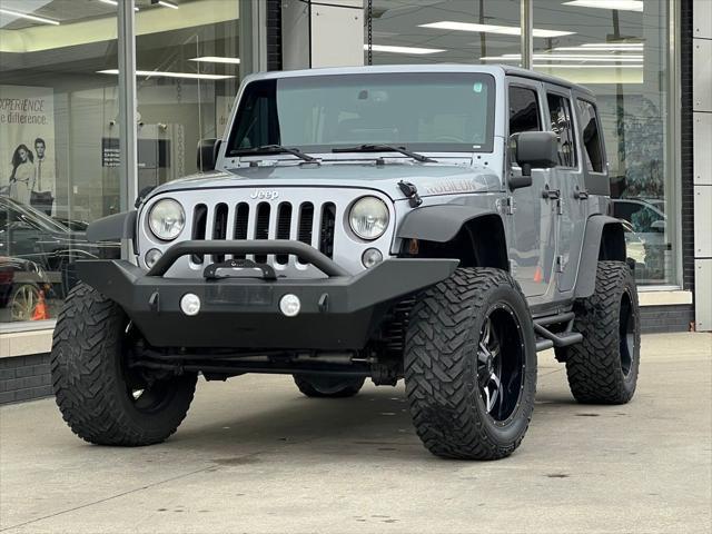 used 2014 Jeep Wrangler Unlimited car, priced at $22,995