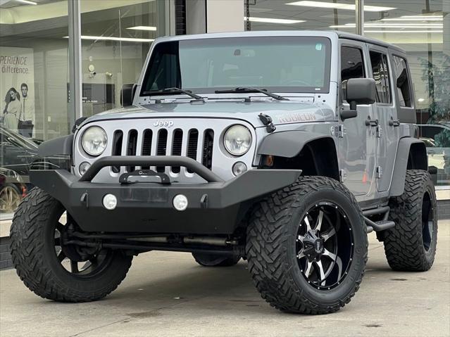 used 2014 Jeep Wrangler Unlimited car, priced at $22,995