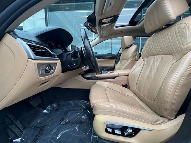 used 2016 BMW 750 car, priced at $19,495