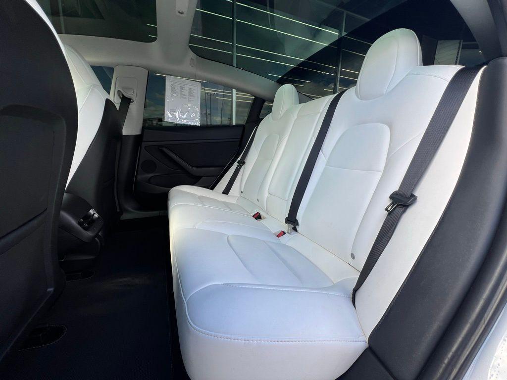 used 2023 Tesla Model 3 car, priced at $24,000