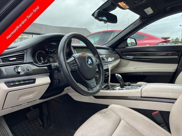 used 2015 BMW 750 car, priced at $18,995