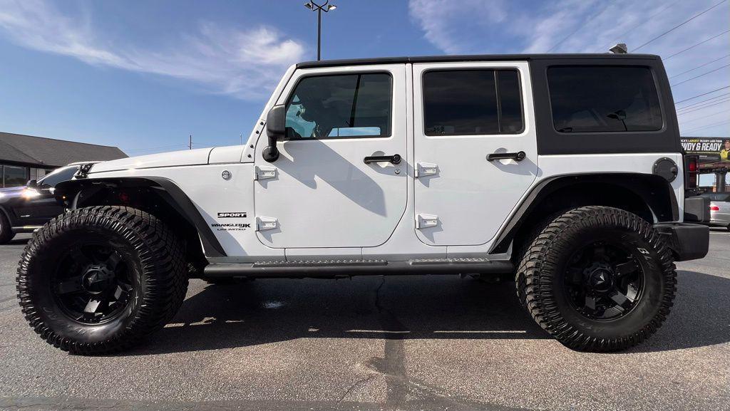 used 2018 Jeep Wrangler JK Unlimited car, priced at $17,700