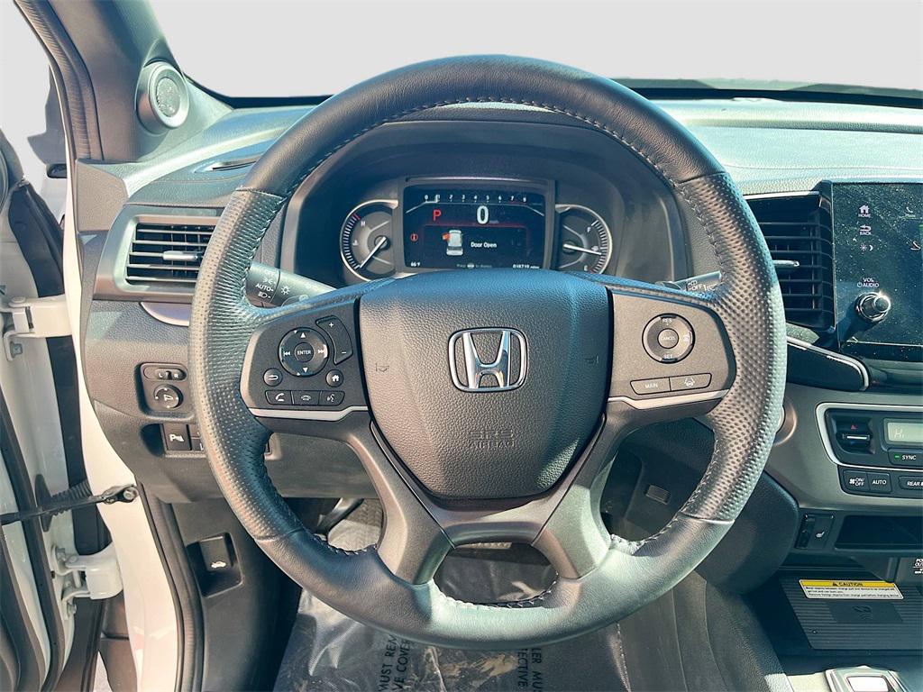 used 2023 Honda Passport car, priced at $28,400