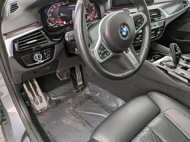 used 2023 BMW M550 car, priced at $56,400
