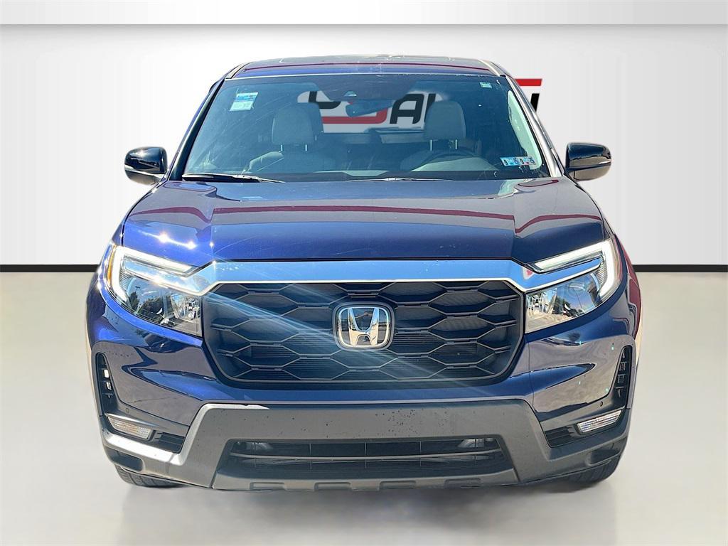 used 2023 Honda Passport car, priced at $27,200