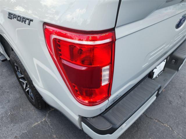 used 2023 Ford F-150 car, priced at $30,552