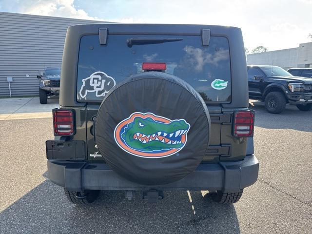 used 2015 Jeep Wrangler Unlimited car, priced at $14,651