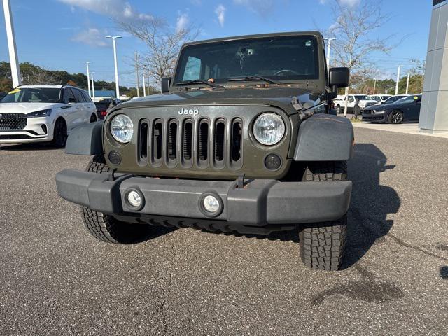 used 2015 Jeep Wrangler Unlimited car, priced at $14,651