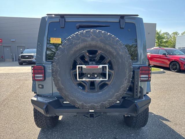 used 2014 Jeep Wrangler Unlimited car, priced at $18,922