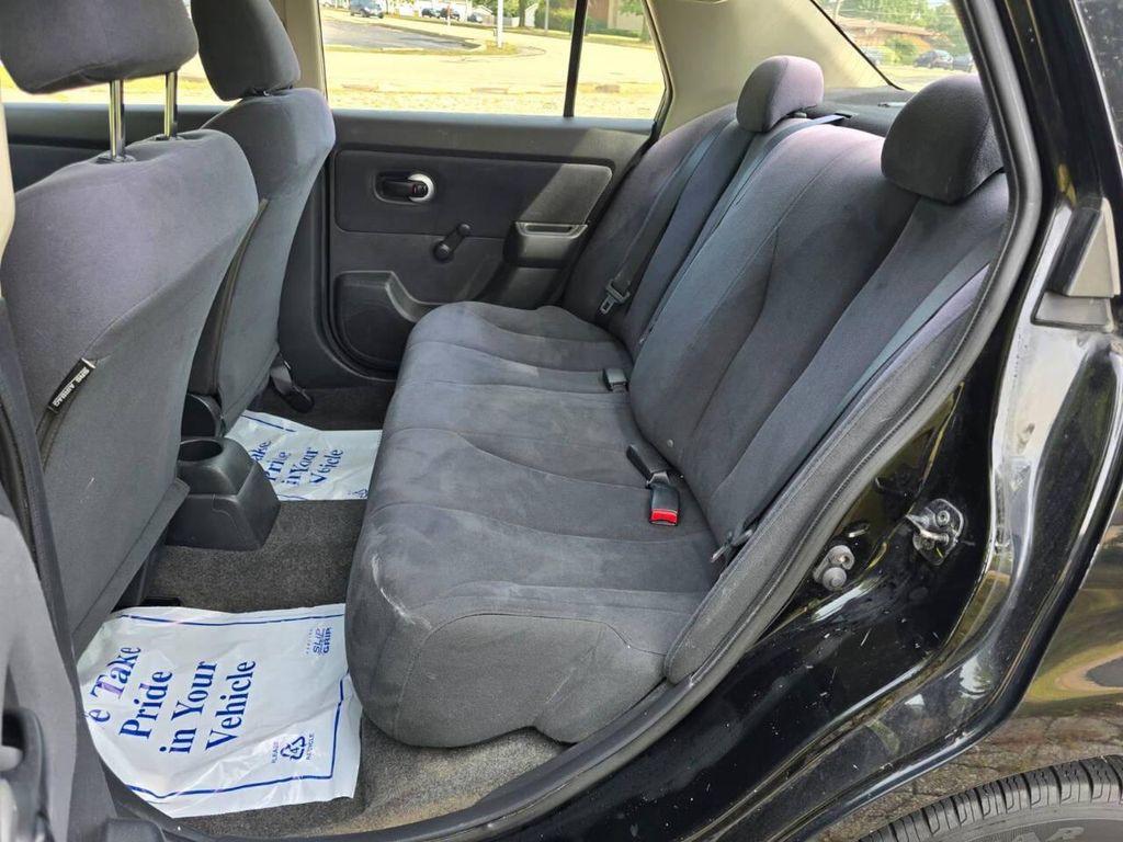 used 2009 Nissan Versa car, priced at $2,999