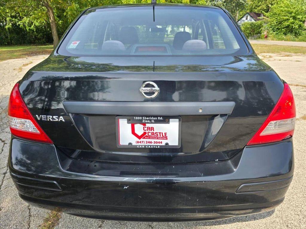 used 2009 Nissan Versa car, priced at $2,999