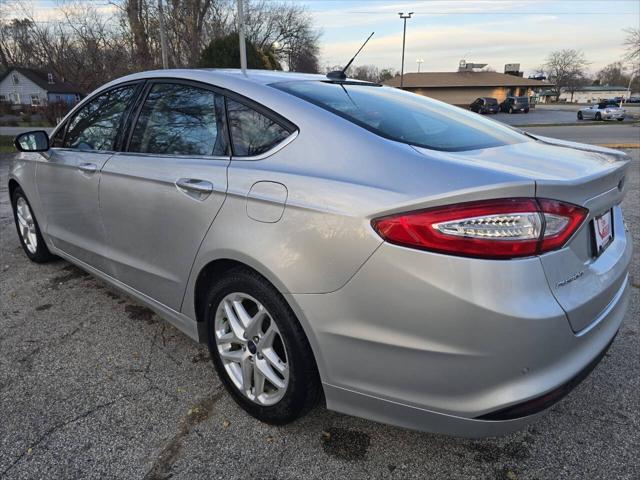 used 2014 Ford Fusion car, priced at $5,999