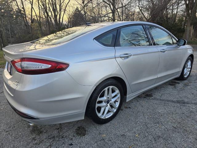 used 2014 Ford Fusion car, priced at $5,999