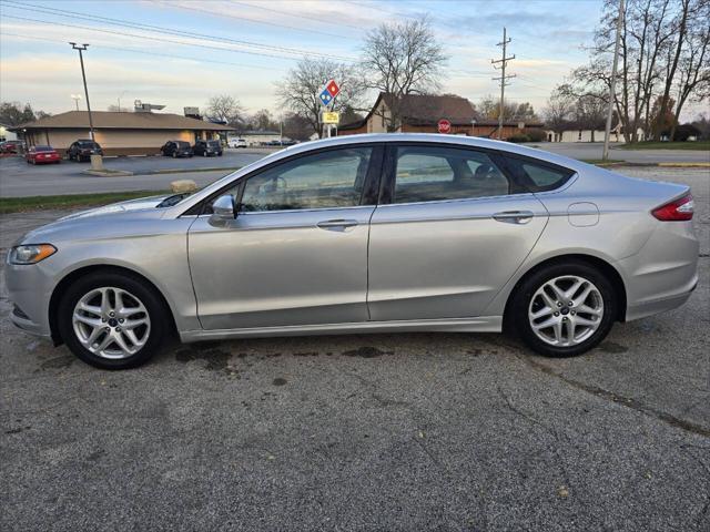 used 2014 Ford Fusion car, priced at $5,999