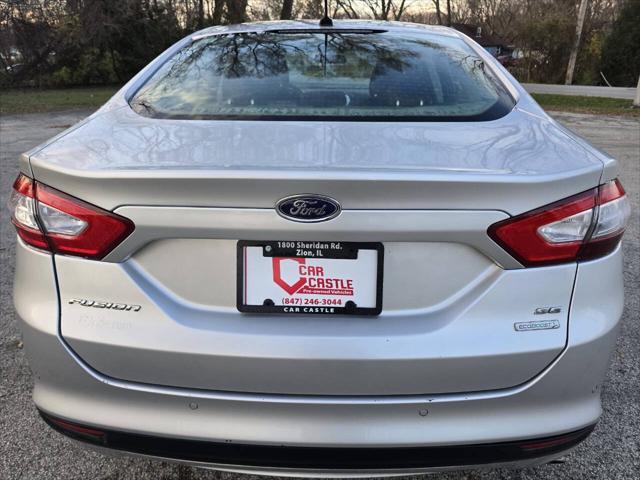 used 2014 Ford Fusion car, priced at $5,999