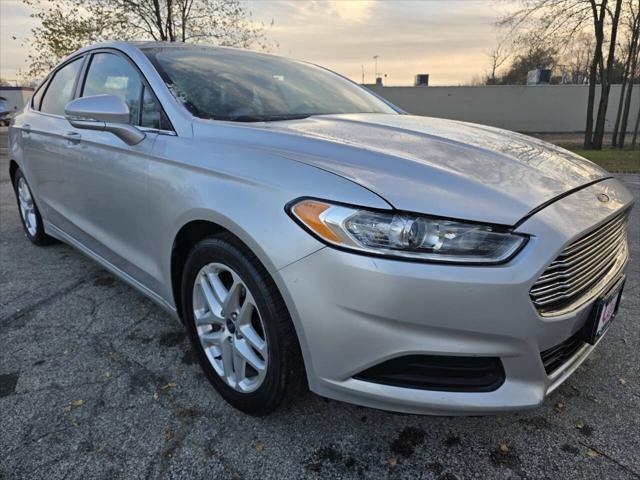 used 2014 Ford Fusion car, priced at $5,999