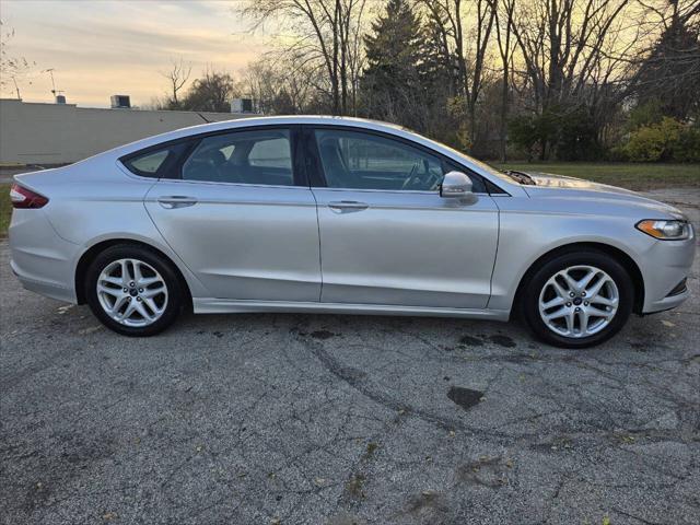 used 2014 Ford Fusion car, priced at $5,999