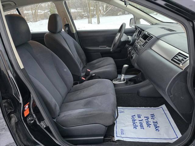 used 2009 Nissan Versa car, priced at $2,999