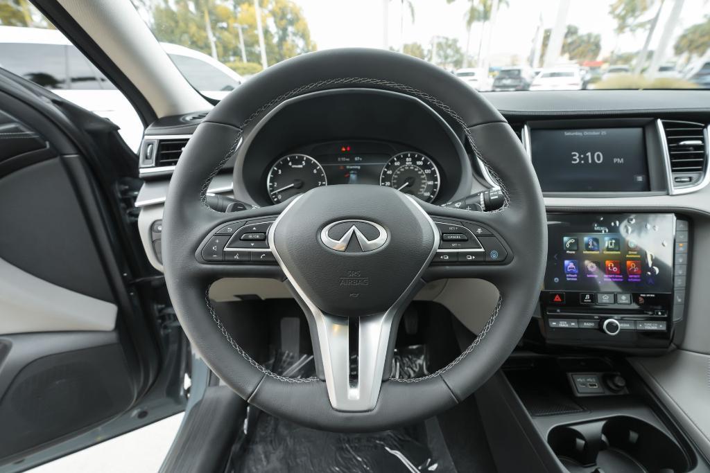 used 2025 INFINITI QX50 car, priced at $37,137