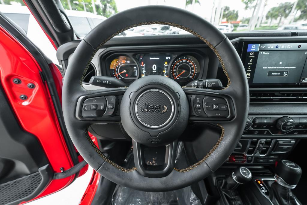 used 2024 Jeep Wrangler car, priced at $38,269